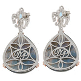 Elegant silver drop earrings with intricate design and labradorite stones, perfect for stylish occasions.